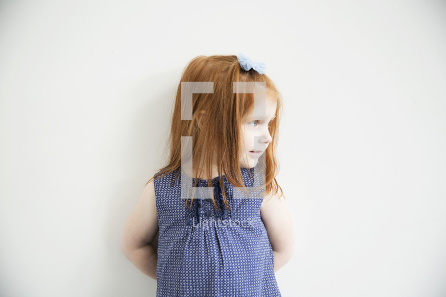 portrait of a red-headed little girl.