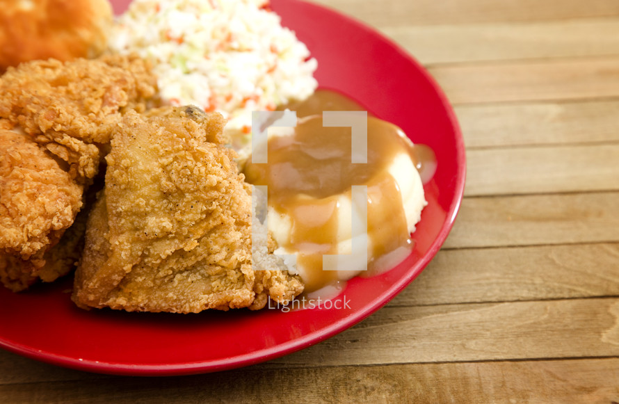 fried chicken and mashed potatoes with gravy 