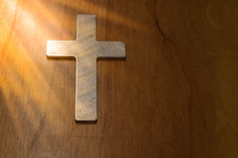 cross on a wood table 