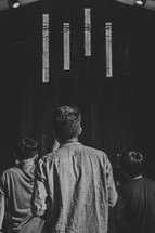 boys standing in a church 