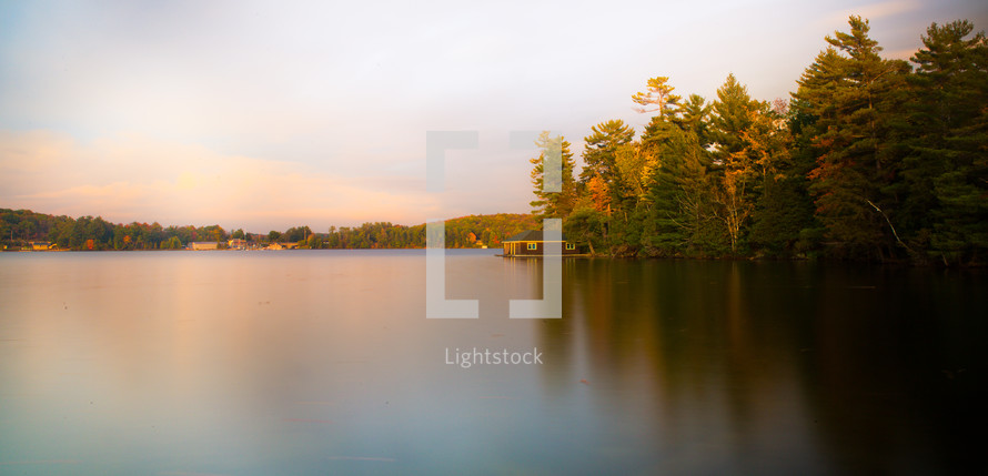 The sun sets over Lake Joseph near Port Carling, ON. The 30 second exposure gives the water a smoothness.