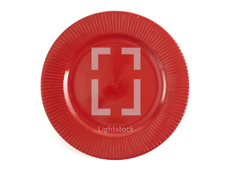 Red plate on white background
