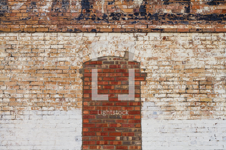 bricked in window on an old warehouse 