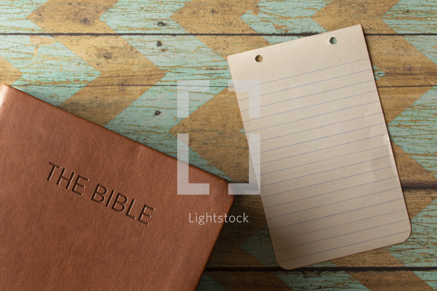 blank paper and Bible cover 