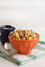 Bowl of Fruit Cereal on a Rustic Wooden Table