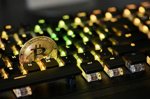 bitcoin on a computer keyboard 