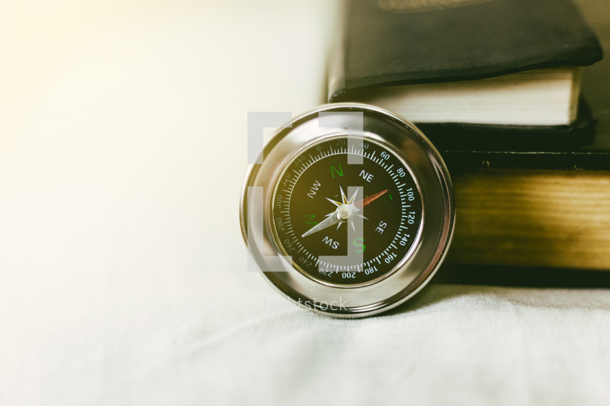 compass and Bible 