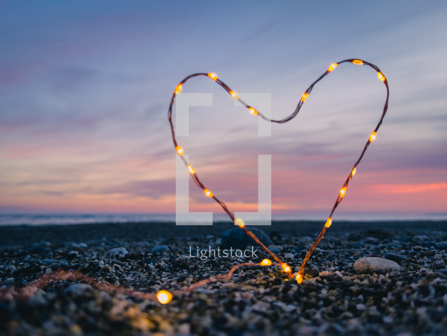 Heart symbol with bright fairy lights 