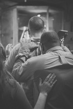 fellowship and prayer at a worship service 