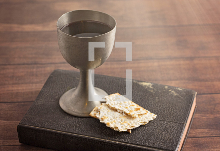 Holy Communion in a Pewter Goblet with an Antique Bible 