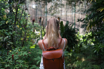 a woman backpacking in the jungle 