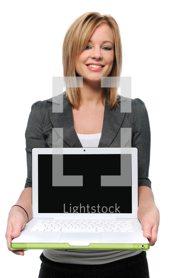Woman holding a laptop computer.