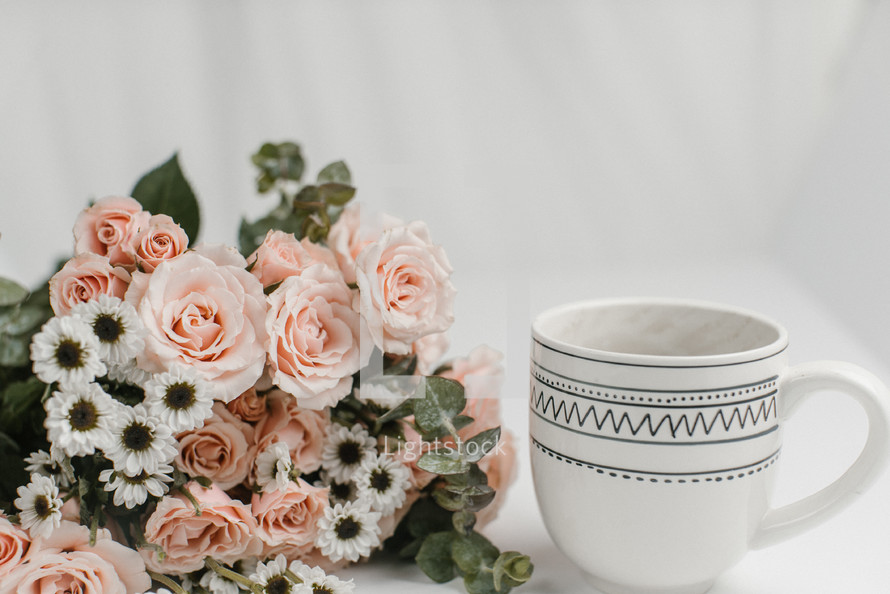 coffee cup and pink flowers 