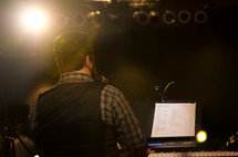 Man playing keyboard during worship