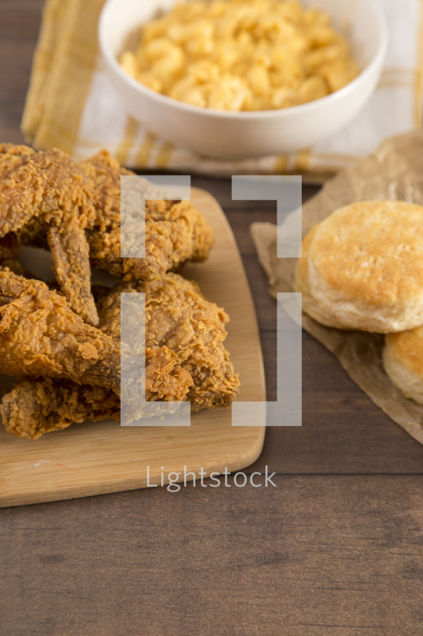 biscuits and Classic Southern Fried Chicken on a Wood Table