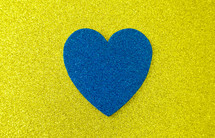 blue heart on yellow 