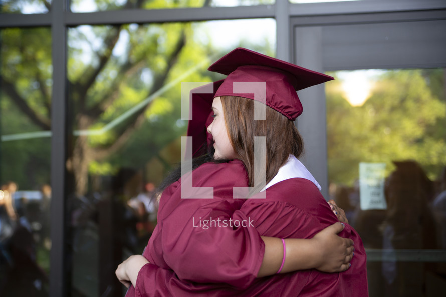 hugs on graduation day 