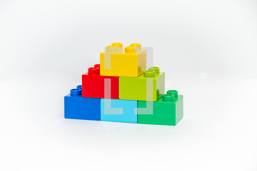 Pyramid of colorful building block bricks 