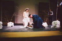 A foot washing ceremony at a wedding. 