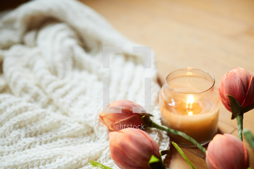 candle and blanket 