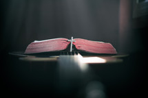 open Bible on a guitar 