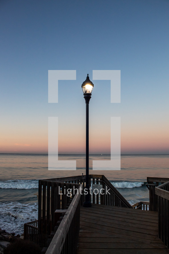 street light on a beach boardwalk 