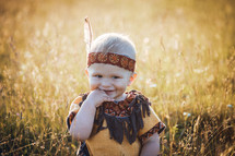 Happy Cute Smiling Little Boy dressed in Indian Clothes 