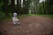 portrait of a toddler boy outdoors 