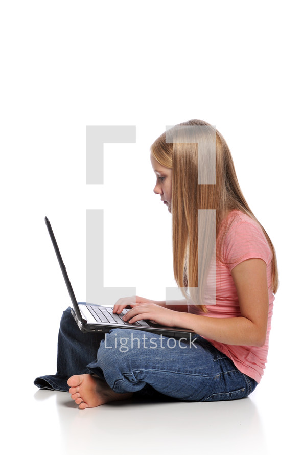 girl child on a laptop 