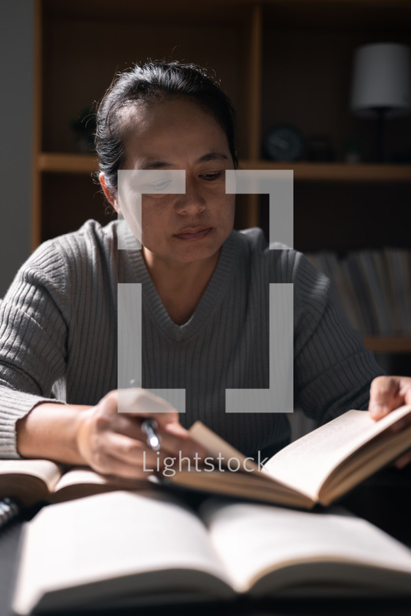 Woman studying a Bible