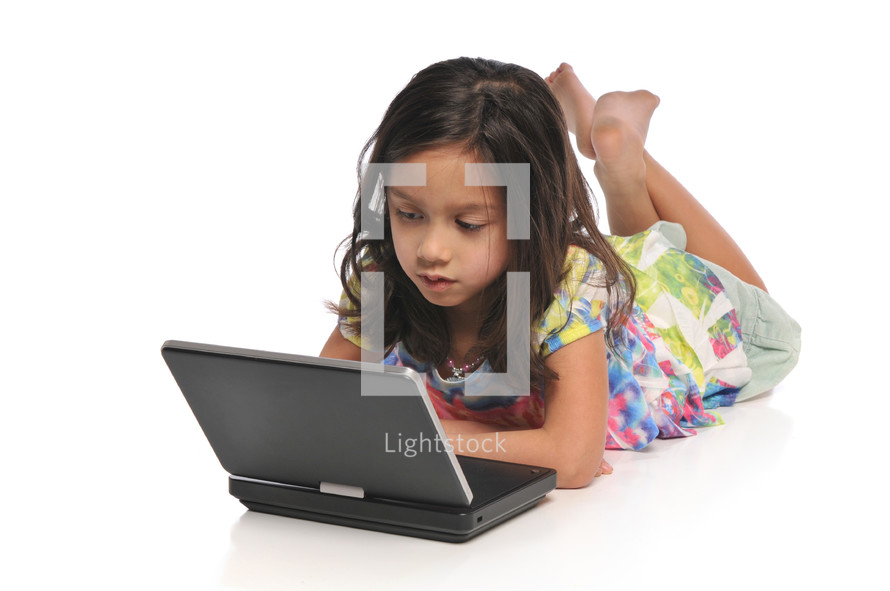 girl child on a laptop 