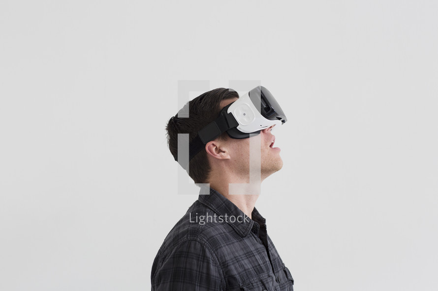 A man wearing VR glasses