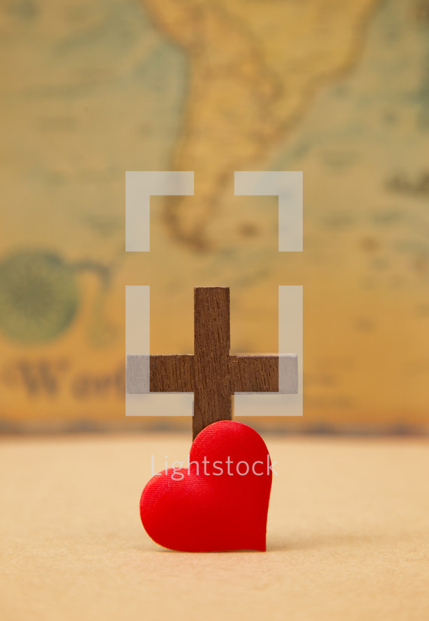 For God so loved the world, - cross and red heart on a map 
