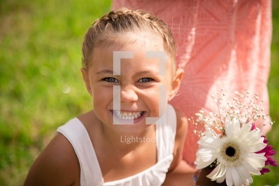 a smiling flower girl 