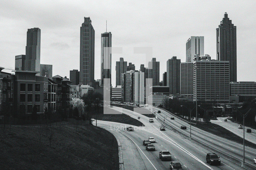 City skyline and freeway traffic.