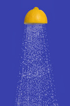 Conceptual Water Flowing Shower From Squeeze Half Of A Lemon