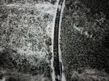 aerial view over a snow road 