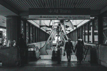escalators at a train station 