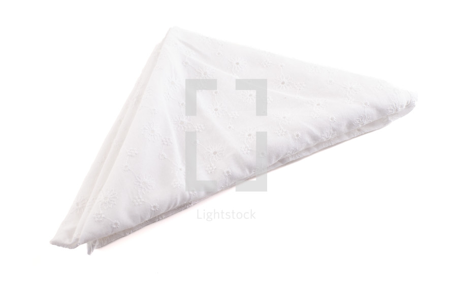 White, folded eyelet napkin