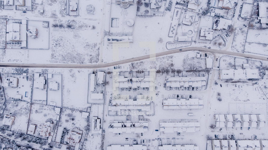 aerial view over a community in winter 