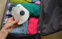 Safe Travel Bag Packed With Clothes, And Medical Masks
