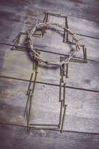 crown of thorns on a cross of nails 