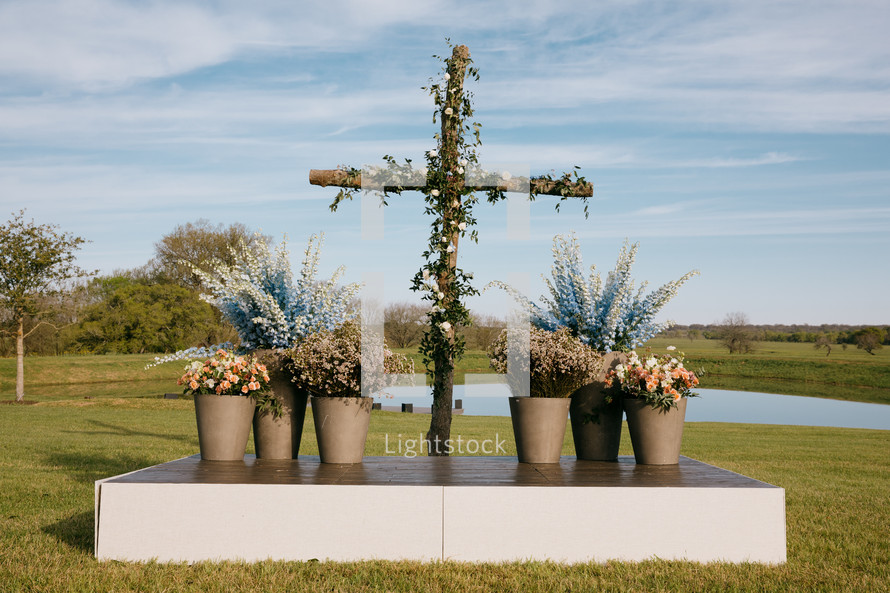 floral altar with cross