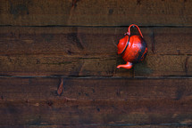 tea pot on a wood background 