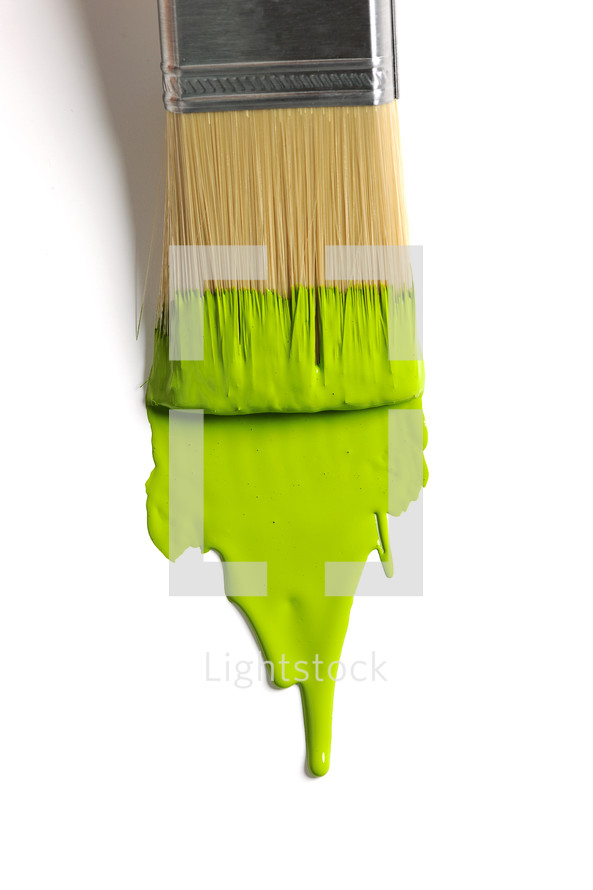 lime green paint on a paint brush 
