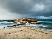 Beach with stormy sea in winter