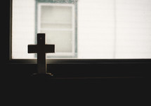 cross in a window 