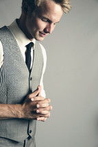 groom with praying hands 