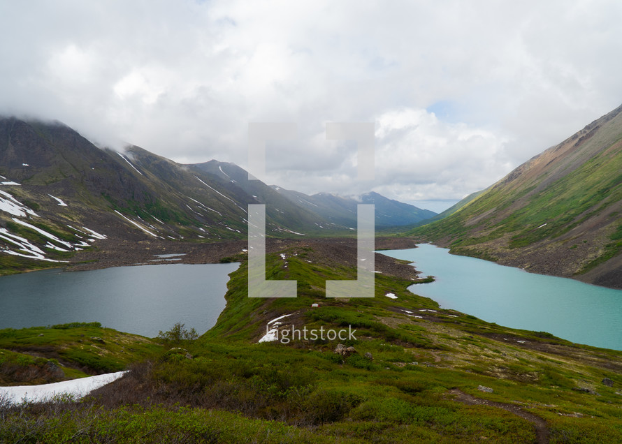 Mountain Landscape with Two Different Colored Lakes in Alaska