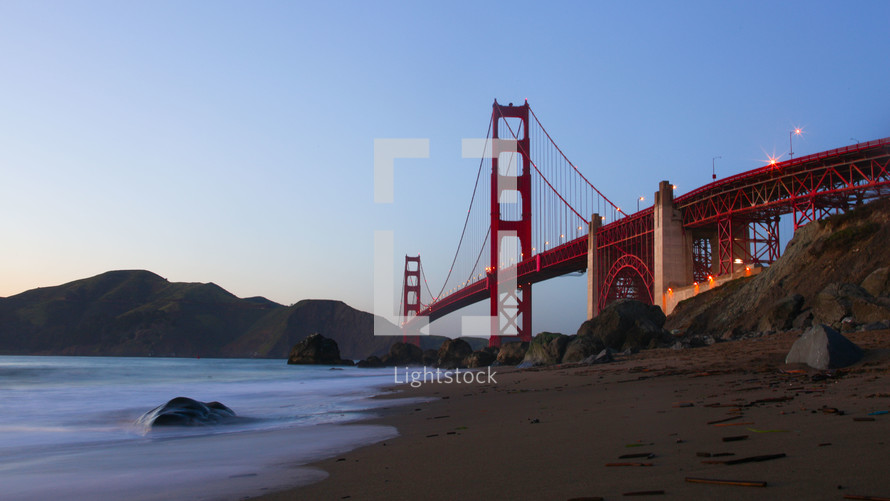 San Francisco view of the Golden Gate Bridge from Baker Beach at sunset